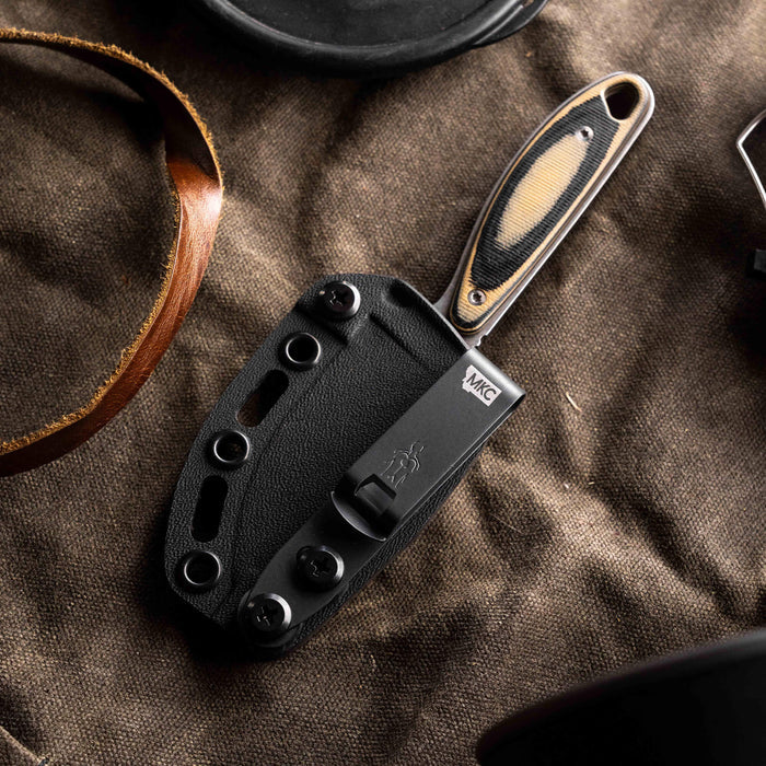 Kydex sheath for the BADROCK knife featuring a sleek design and secure attachment points, ideal for outdoor use.