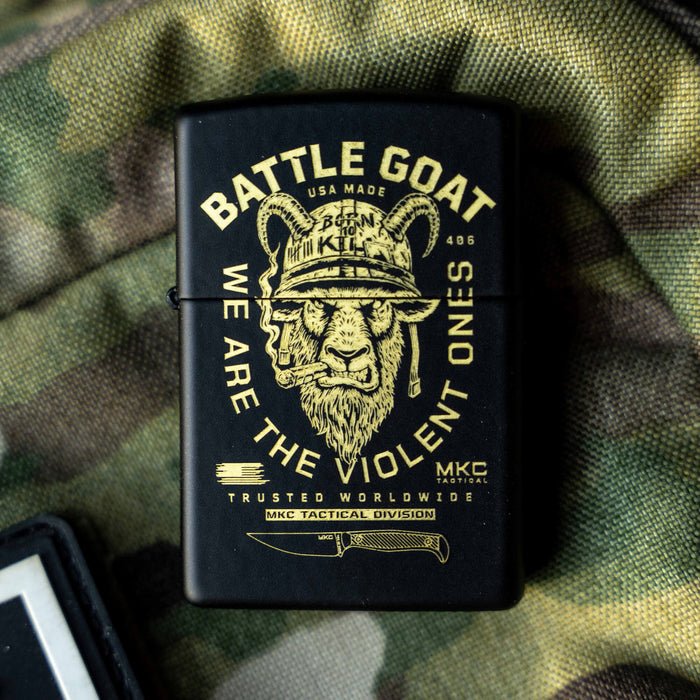 Black Zippo lighter featuring a gold graphic of a goat's head with helmets and the text "BATTLE GOAT WE ARE THE VIOLENT ONES.