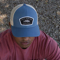 Broken Line Patch Trucker Hat in blue