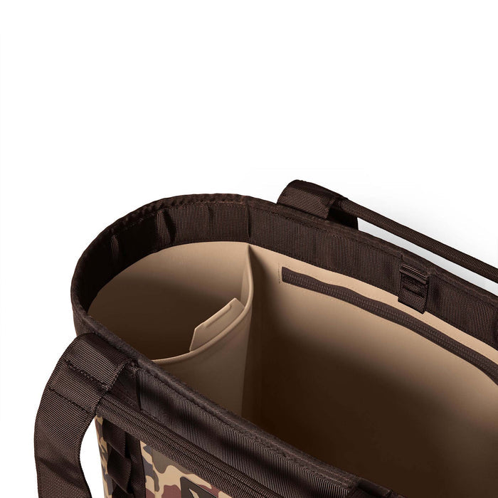 Interior view of YETI Camino 35 tote showing open storage pocket and tan inner lining.