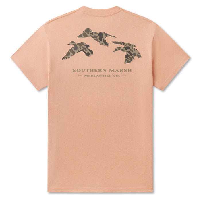 Peach-colored t-shirt with camouflage duck designs and 'Southern Marsh' text on a white background