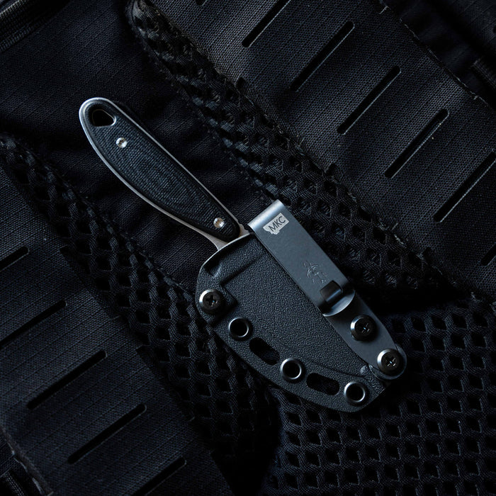Kydex sheath for Castle Rock knife, featuring a sleek design and secure attachment for outdoor and tactical use.