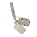 Dual Wristlet in Forest Saltwater Camo with two detachable zippered pouches and a wrist lanyard for easy use.
