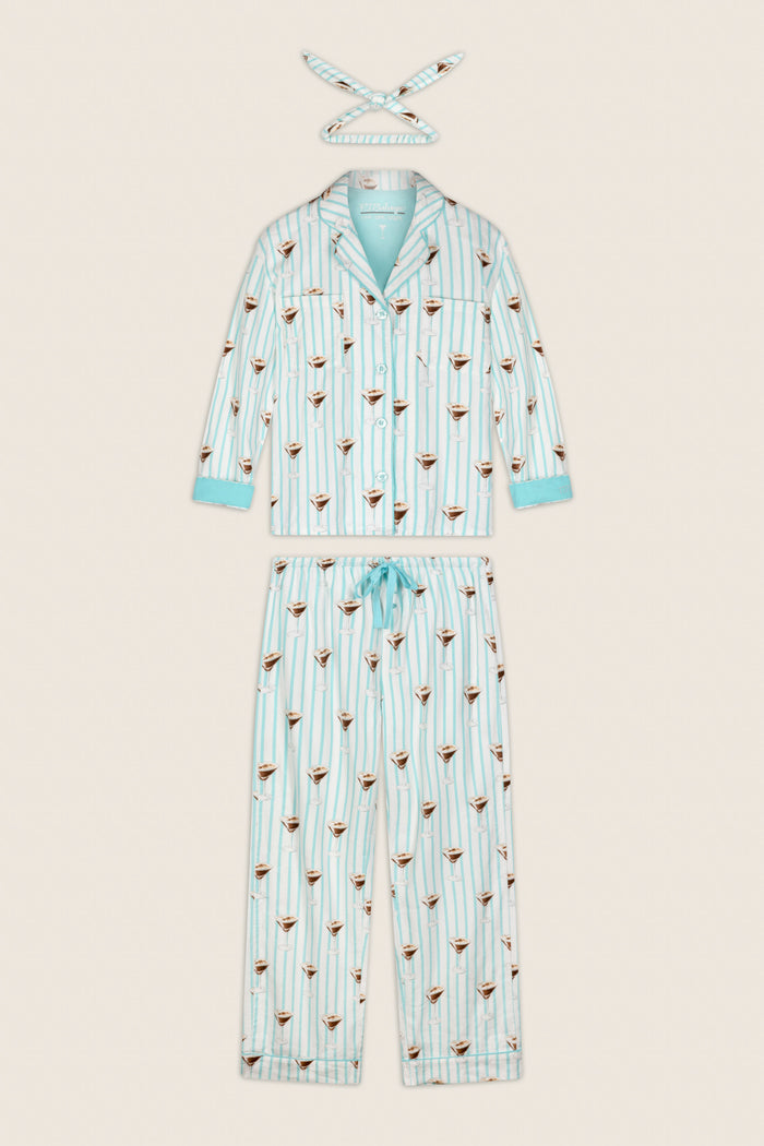 The P.J. Salvage Espresso Martini Print 3-Piece Long Sleeve Flannel PJ Set, featuring a button-up top, matching pants with a drawstring waist, and a coordinating headband, is displayed laid flat on a neutral background.