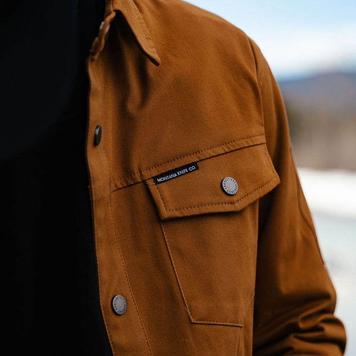 Coyote-colored Hamilton shacket from Montana Knife Company, featuring a chest pocket and button details.