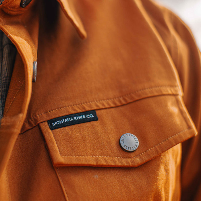 Coyote-colored Hamilton shacket from Montana Knife Company featuring a logo patch and button closure.