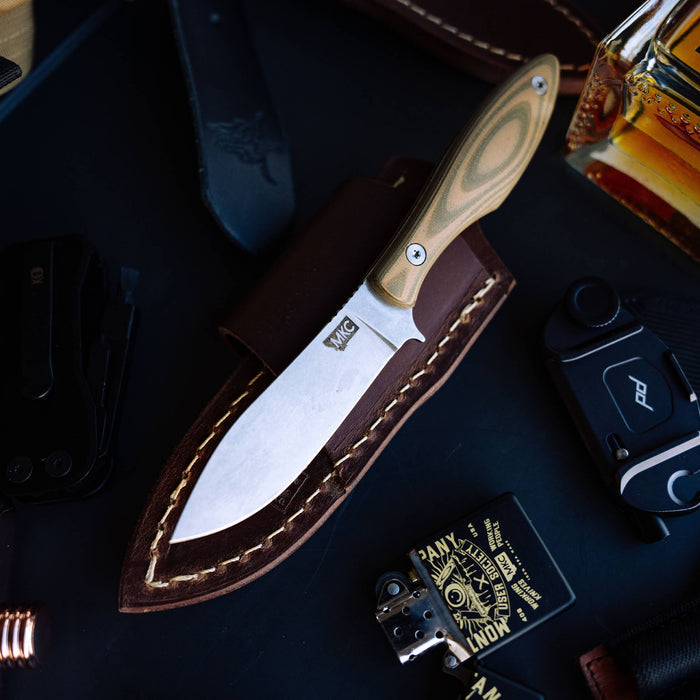 Horizontal leather sheath for Jackstone knife, showcasing durable craftsmanship and practical design for belt carry.