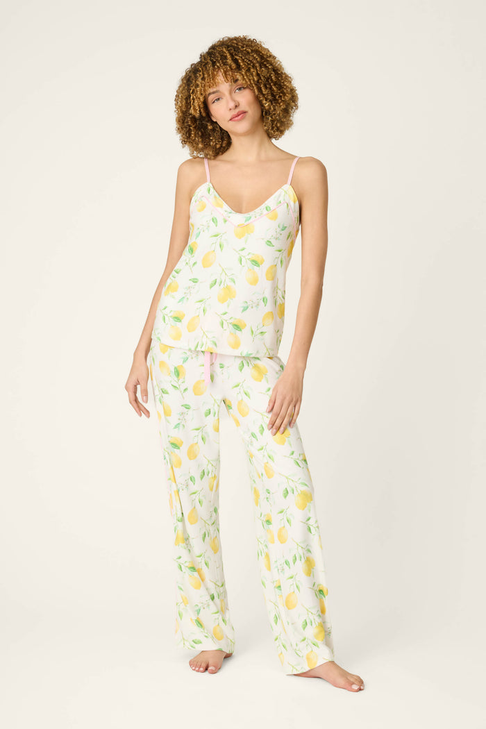 Fabric features a cheerful lemon print on a light background, with smooth texture and vibrant yellow accents throughout.