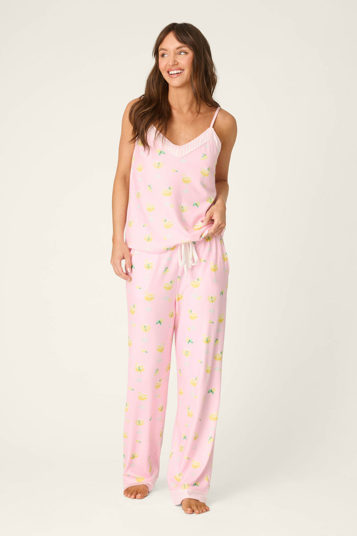 Light pink fabric with a small yellow and green print pattern, soft appearance, smooth texture.