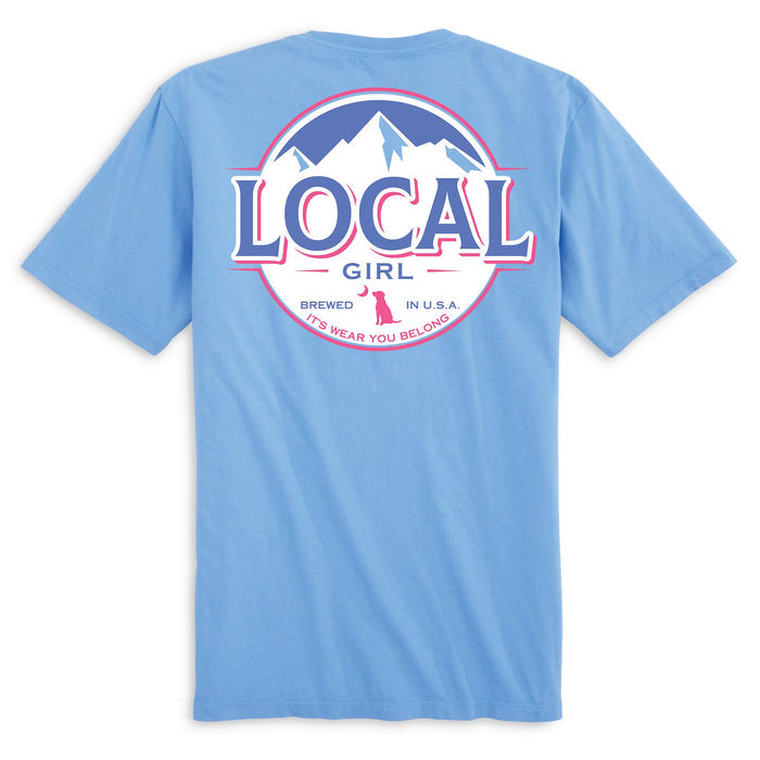 Local Girl Outfitters short sleeve t-shirt, color washed denim, sizes S-XXL, 100% cotton. Back design has a pink, blue, & white mountain circle logo with “Local Girl” and tagline “It’s Wear You Belong.”