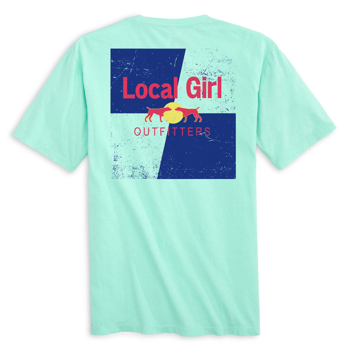 Local Girl Outfitters island reef tee with distressed back graphic featuring navy and blue blocks, coral text, and two coral dogs facing a yellow sun.
