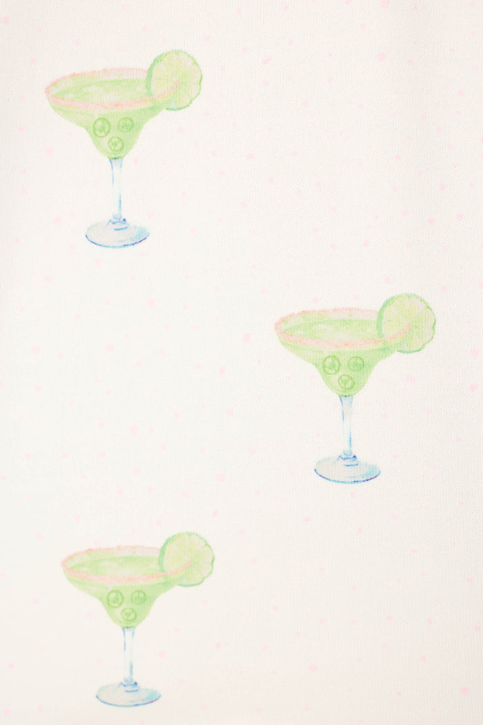 The Margarita Mama Spicy Sips 3-Piece PJ Set by P.J. Salvage features a playful diagonal pattern of illustrated margarita glasses with green drinks and lime slices on a white background with pink dots—perfect for sleep or lounging.