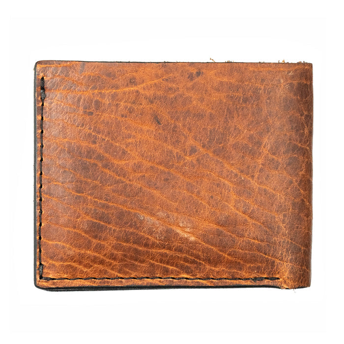 MKC Bison Skull leather wallet featuring a rugged, vintage brown finish and durable stitching for everyday use.