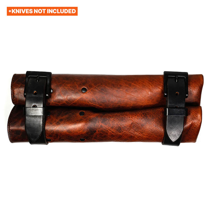 Brown leather knife roll with black buckles, designed for storing culinary knives, made in the USA.