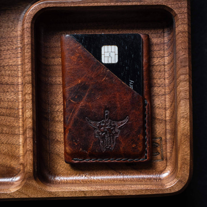 MKC EDC Dump Tray featuring a leather wallet resting on a wooden tray, designed for organizing everyday carry items.