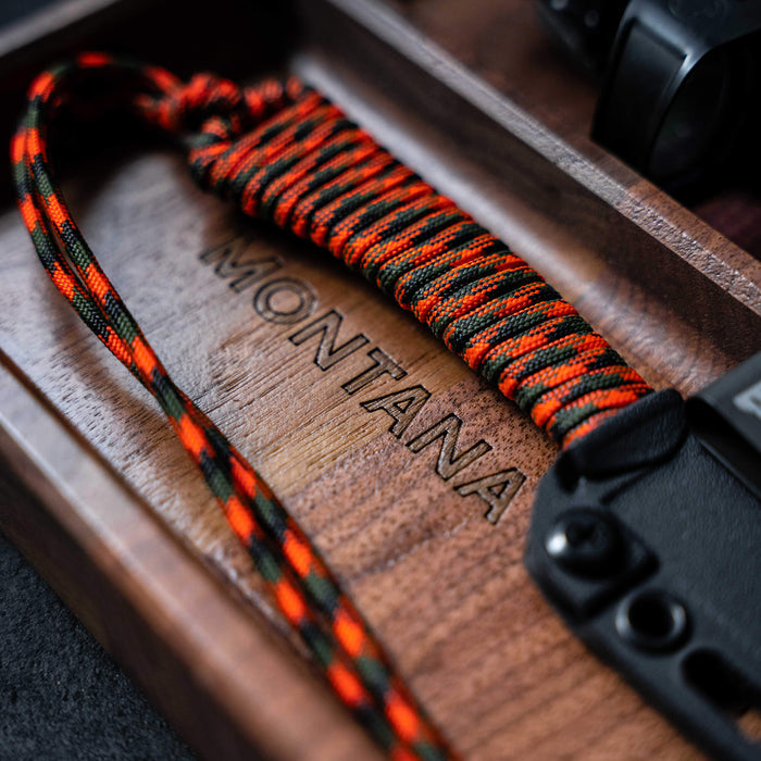 MKC EDC Dump Tray featuring a wooden base with "MONTANA" engraved and a colorful paracord handle.