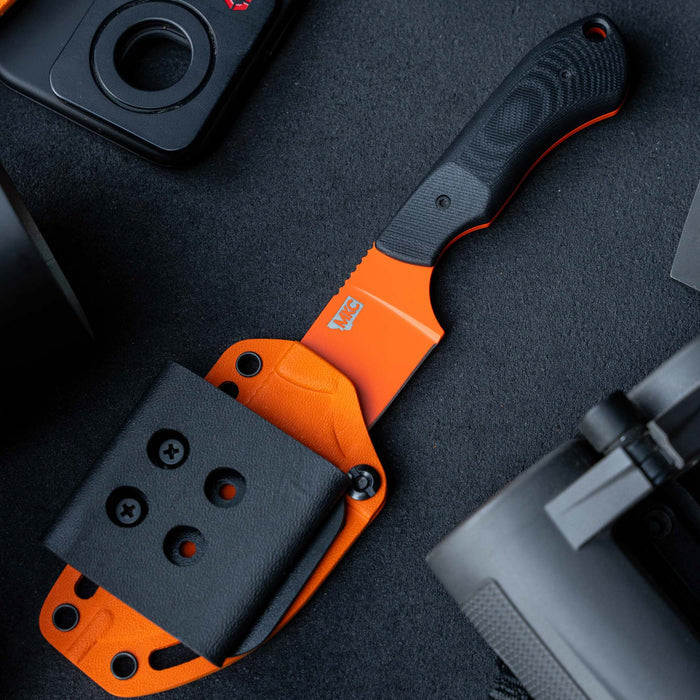 MKC Elk Knife with additional Kydex sheath, featuring a durable handle and secure sheath for outdoor use.