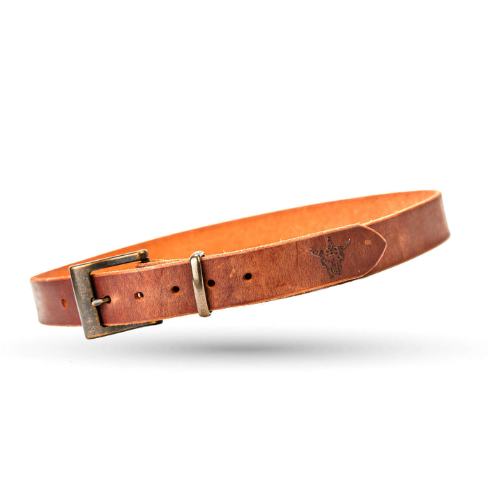 Brown leather belt from Montana Knife Company featuring a classic metal buckle and embossed logo, ideal for everyday wear.