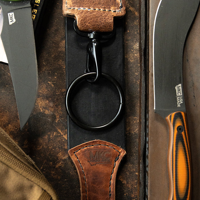 MKC Leather Strop made in the USA, featuring a durable leather surface and a metal clip for easy handling.