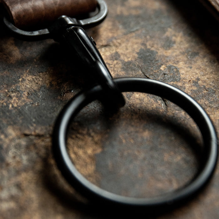 Close-up of the MKC Leather Strop, showcasing its durable leather and metal hardware for knife sharpening.