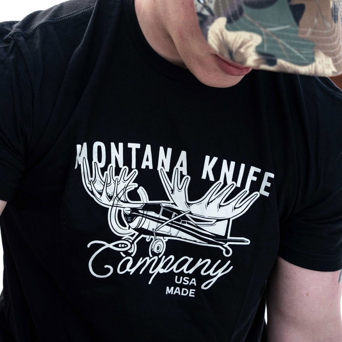 Black Montana Knife Company Moose Tee featuring a moose graphic and logo, ideal for outdoor enthusiasts and professionals.