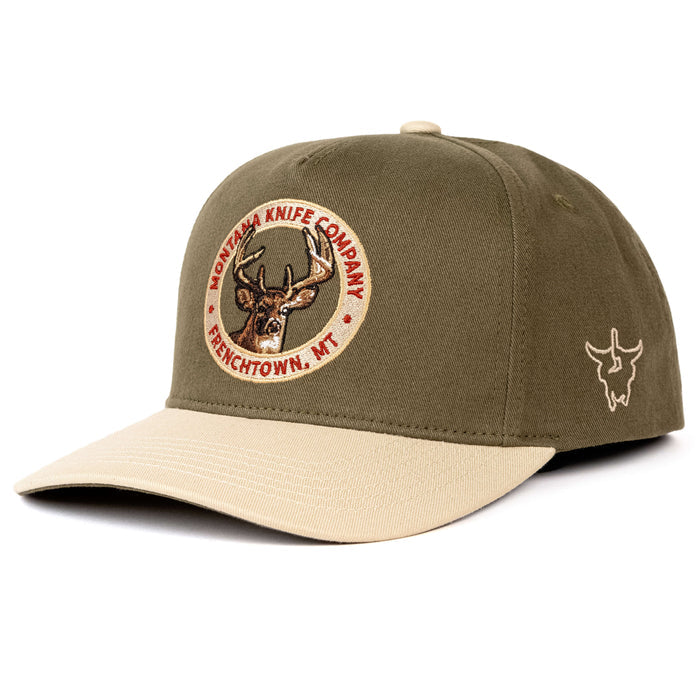 Olive green baseball cap featuring a deer logo and Montana Knife Company branding, ideal for outdoor enthusiasts.