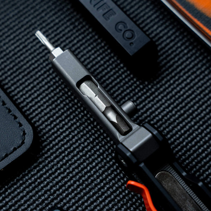 Close-up of the MKC X BIG IDEA DESIGN Ti EDS II tool showcasing its sleek titanium design and precision screwdriver.