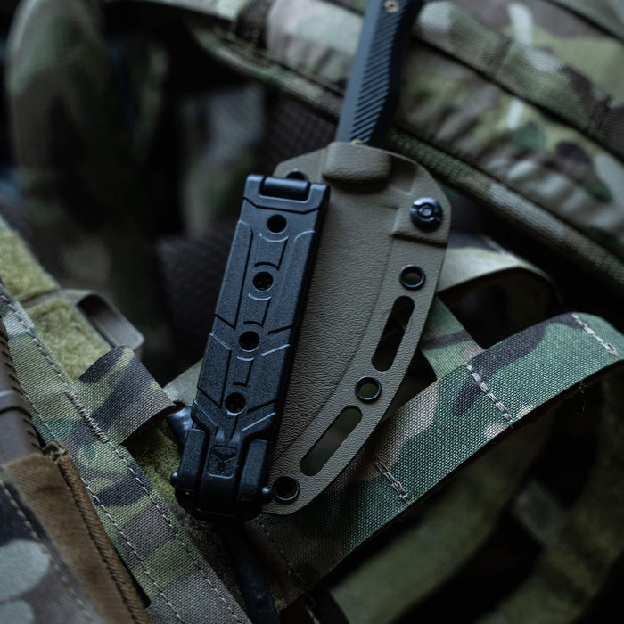 MOLLE-LOK attachment securely mounted on tactical gear, designed for versatile knife and tool accessibility.