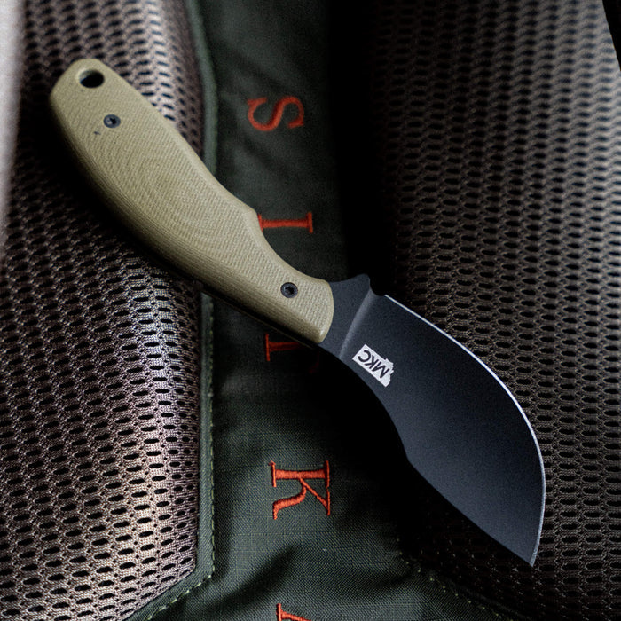 Montana Knife Company's PACKOUT SKINNER in olive green with a curved black blade, designed for outdoor and hunting use.