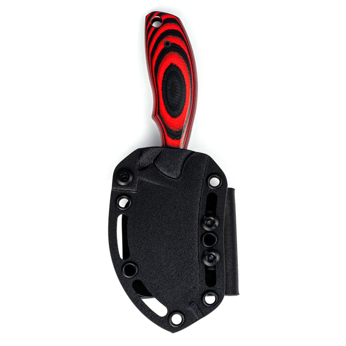 PACKOUT SKINNER PVD knife in red and black with a durable sheath, designed for outdoor and hunting use.