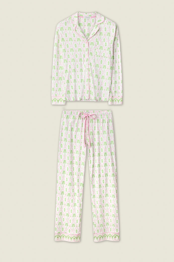 The Playful Prints Island Time Long PJ Set by P.J. Salvage is a two-piece ivory pajama set in soft cotton-modal jersey with a button-up top and drawstring pants, featuring a pink and green floral print.