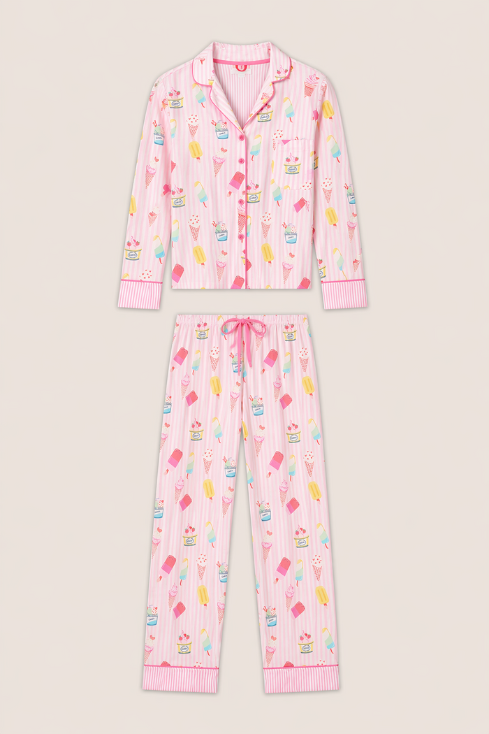 The P.J. Salvage Playful Prints Sugar Rush Long PJ Set features a pink and white striped cotton-modal jersey with a button-up long sleeve top and matching pants, decorated with colorful pastel ice cream and popsicle prints.