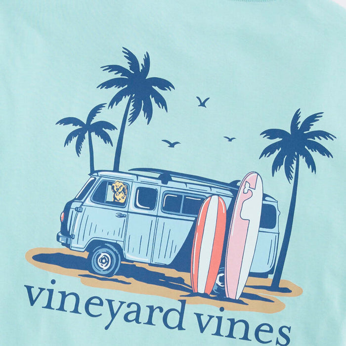Vineyard Vines t-shirt with a van, surfboards, and palm trees on a light blue background