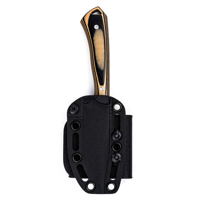 Rocker knife in tan and black with a textured handle, displayed in a black sheath for secure storage.