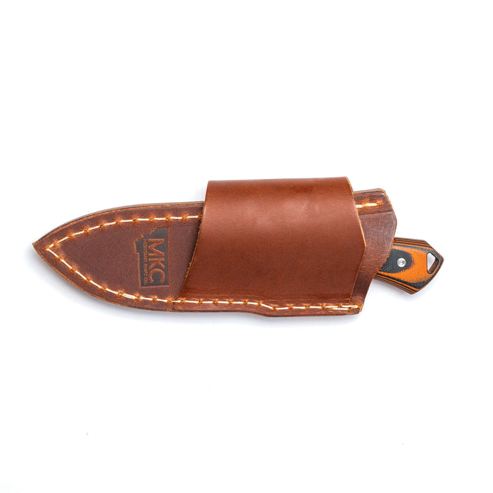 Horizontal leather sheath designed for secure belt carry, featuring durable construction and a sleek finish.