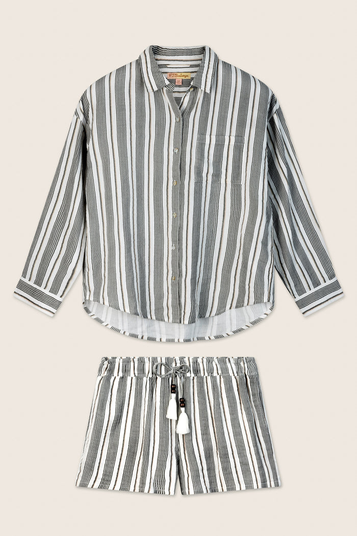 The P.J. Salvage Sea You in St. Tropez Shoreline Stripe Short Set features a relaxed button-front shirt and shorts in soft cotton double gauze with vertical black, white, and gray stripes, shown on a light beige background.