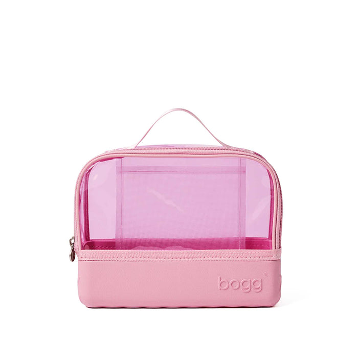 Bogg Clear Belt Bag in Pink Bubbles front view with a clear pink body, solid base, zippered closure, and handle on top.