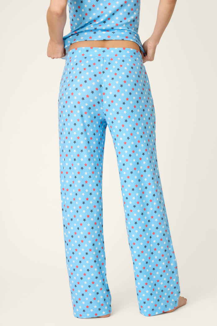 Bay blue fabric with a star print pattern, soft texture and summery feel.