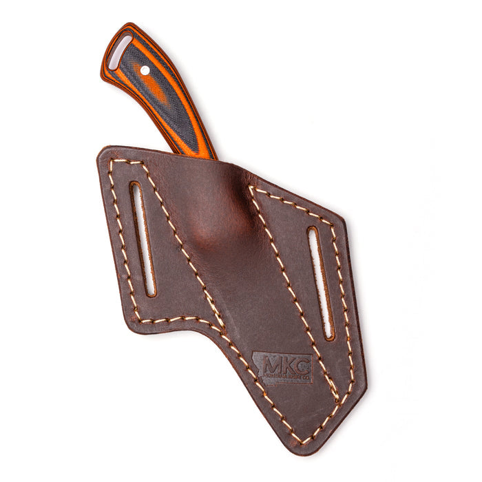 Angled belt carry leather sheath for knives, featuring durable stitching and a secure fit for easy access.