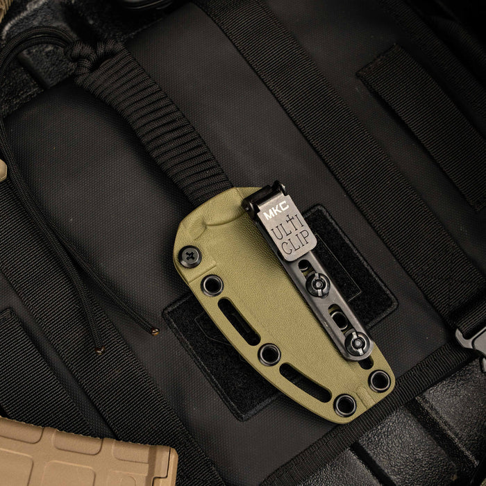 Kydex sheath for Tactical Speedgoat knife featuring a secure clip and durable design for tactical use.