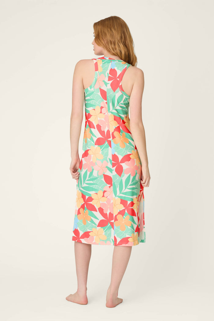 Buttery-soft jersey fabric with a bright green, red, orange, and yellow tropical print.