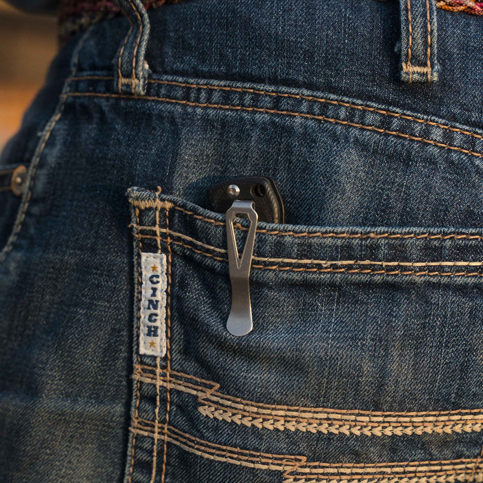Montana Clip Replacement Kit shown in a pocket of denim jeans, highlighting its practical design for everyday use.