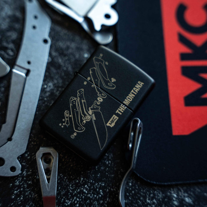 Montana Traditional Windproof Zippo Lighter featuring a sleek design, surrounded by knife components and MKC branding.