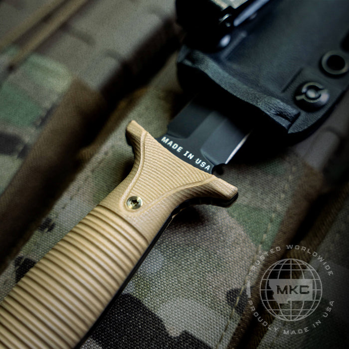 Kydex sheath for V24 knife, featuring a textured handle and durable construction, designed for outdoor and tactical use.