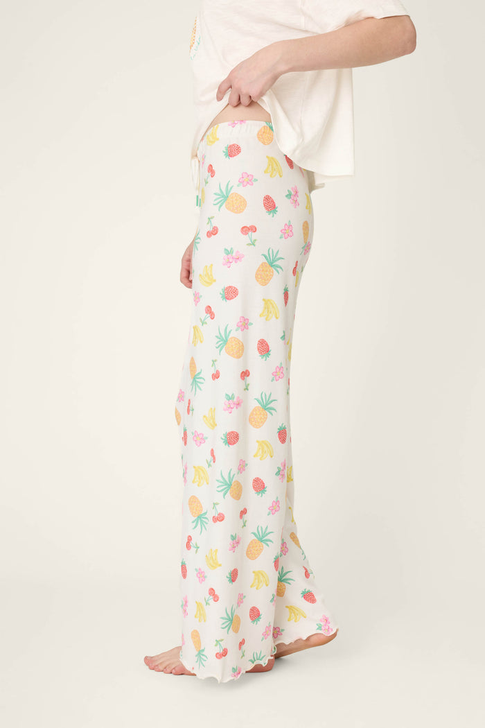 A fabric featuring a vibrant, colorful fruit pattern set against a plain light background.