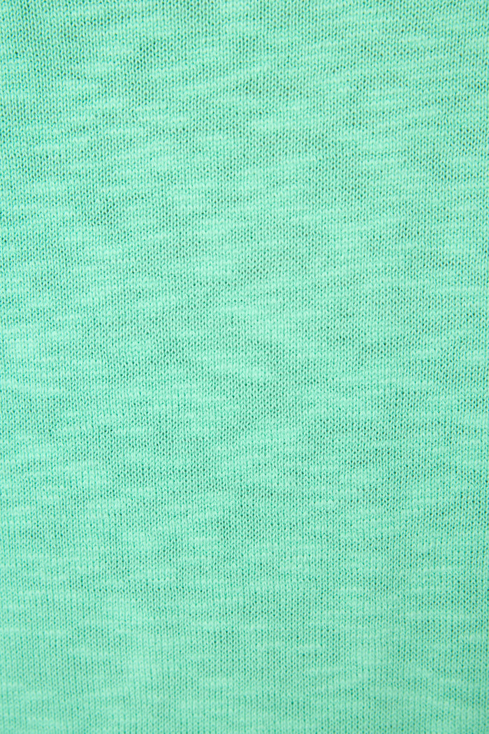 Textured knit patterns in a solid light turquoise color with subtle shading variations.