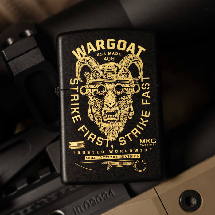 WARGOAT ZIPPO lighter featuring a goat with tactical goggles and the phrase "Strike First, Strike Fast" in gold on a black background.